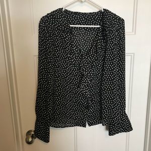 Black and white patterned blouse
